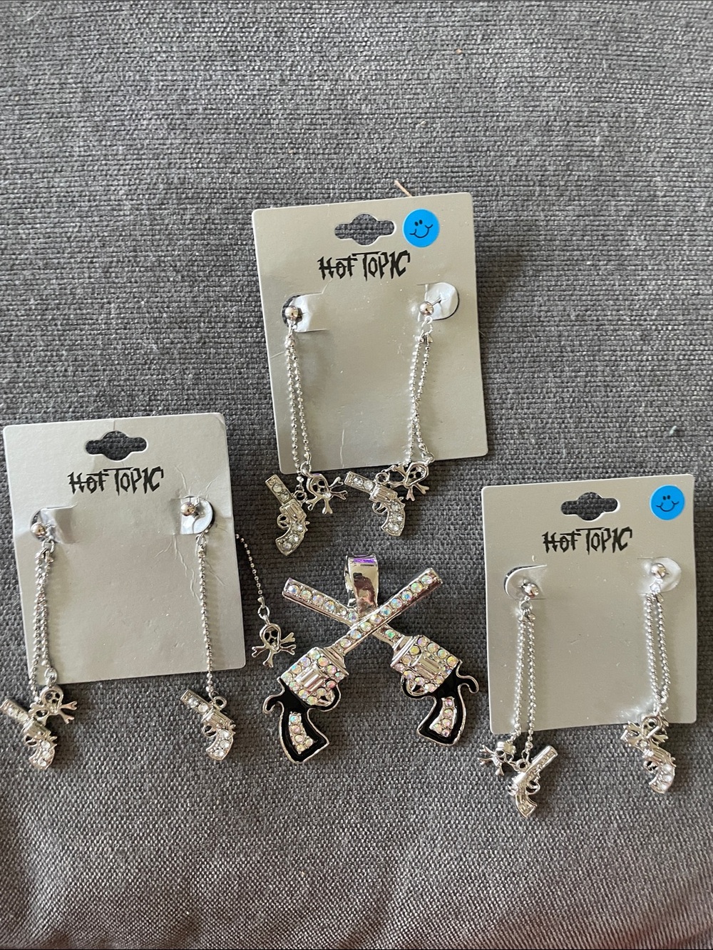 Hot Topic Silver Rhinestone Crossed Gun Pendant and Dangle Earring Set